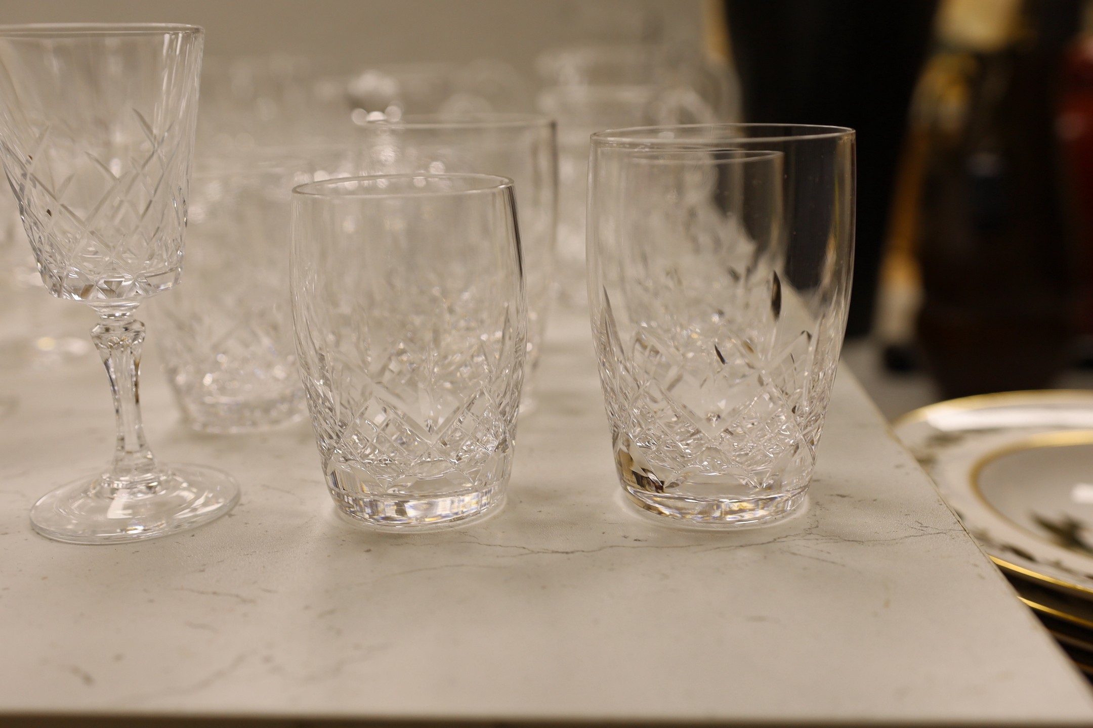 A large collection of suites of mostly Stuart cut glass, including, wine glasses, spirits glasses and jugs